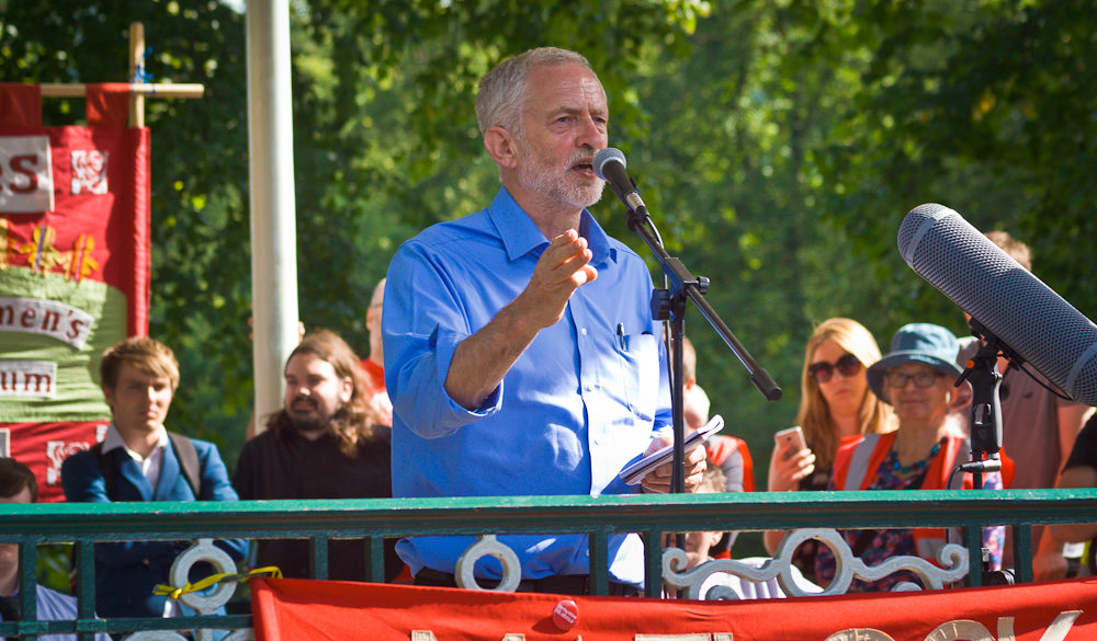 http://new-pretender.com/wp-content/uploads/2018/01/Jeremy_Corbyn_Leader_of_the_Labour_Party_UK_speaking_at_rally-e1517141544524.jpg